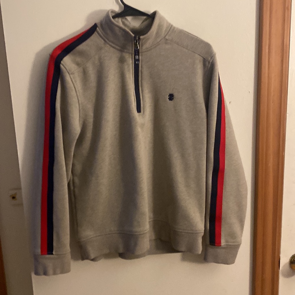 A normal grey fuzzy zip up jacket from IZOL.